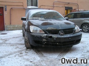 Битый автомобиль Mitsubishi Lancer