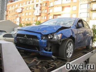 Битый автомобиль Mitsubishi Lancer