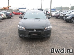 Битый автомобиль Mitsubishi Lancer