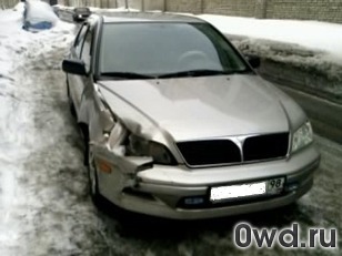 Битый автомобиль Mitsubishi Lancer Cedia